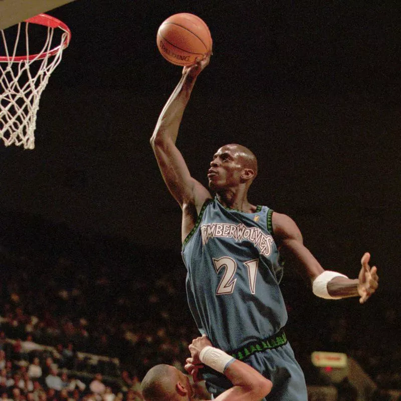 Kevin Garnett slams the ball against the Indiana Pacers