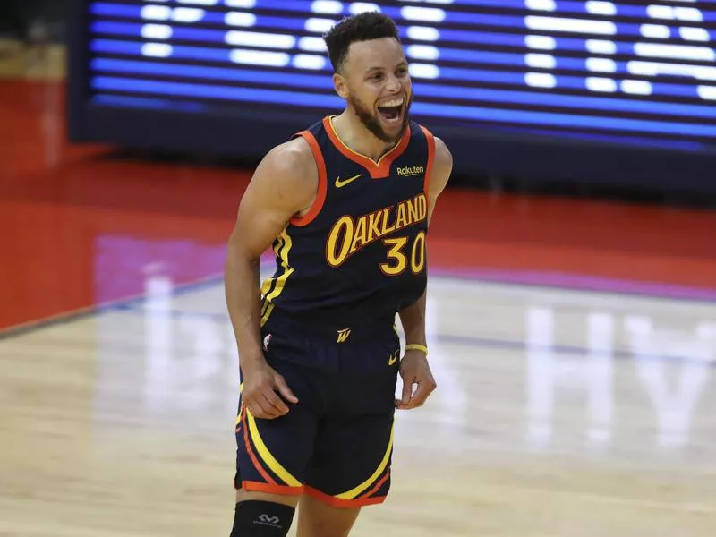 Stephen Curry celebrates