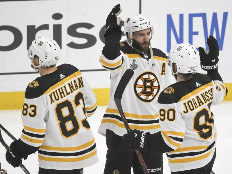 Patrice Bergeron, Karson Kuhlman, Marcus Johansson