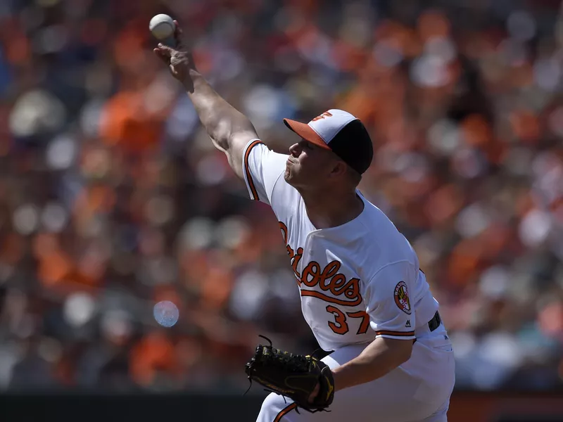 Dylan Bundy delivers a pitch