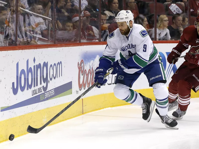 Zack Kassian skating with puck