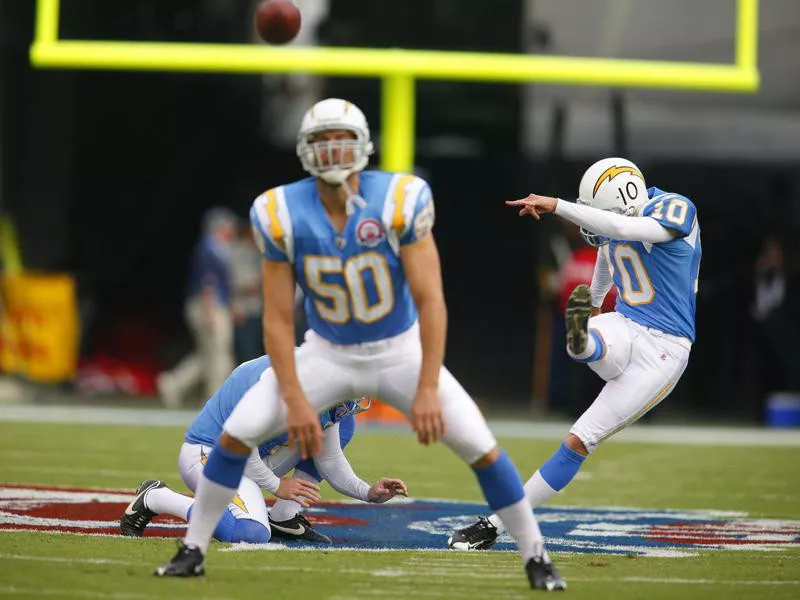 San Diego Chargers center David Binn and place kicker Nate Kaeding during warmups prior to game