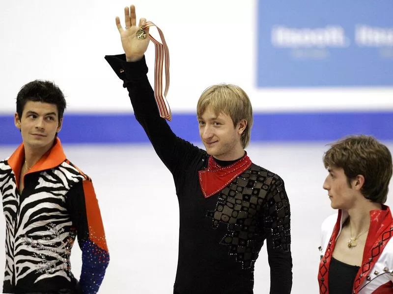 Famous Russian figure skater Evgeni Plushenko on the podium