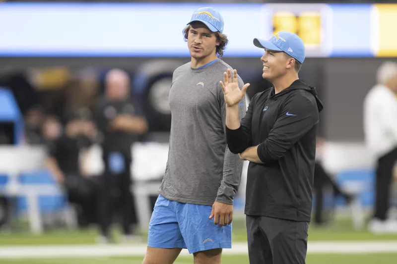 Los Angeles Chargers quarterback Justin Herbert, left, and offensive coordinator Kellen Moore