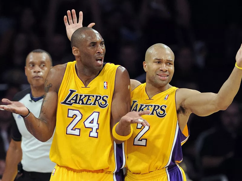 Kobe Bryant and Derek Fisher question a call