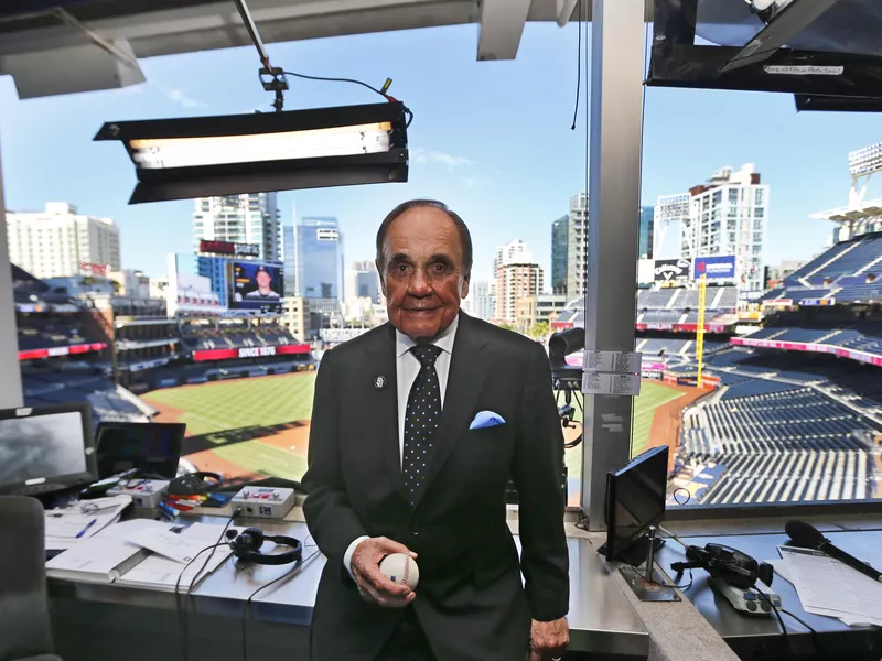 Dick Enberg poses