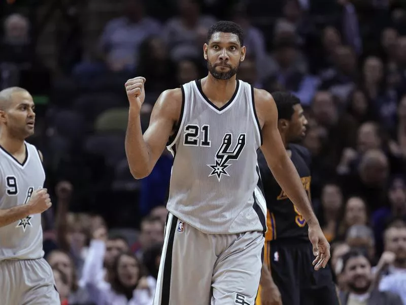 San Antonio Spurs’ Tim Duncan and Tony Parker celebrate