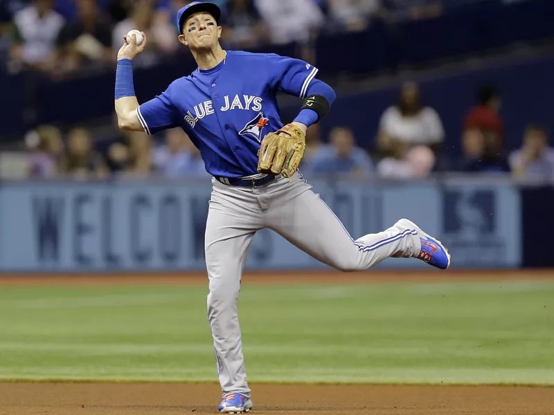 Toronto Blue Jays shortstop Troy Tulowitzki throws out Tampa Bay Rays' Tim Beckham