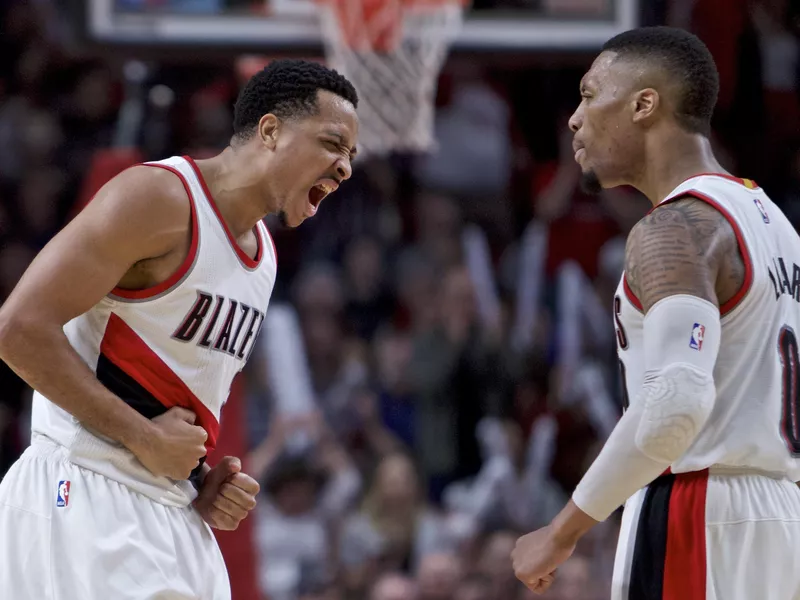 CJ McCollum and Damian Lillard react