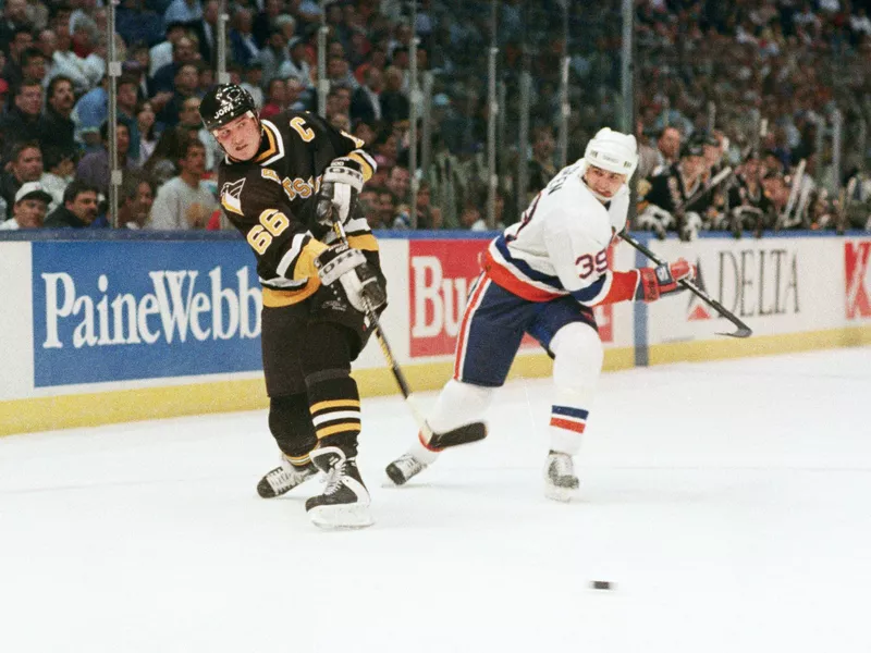 Pittsburgh Penguins Mario Lemieux shoots on goal