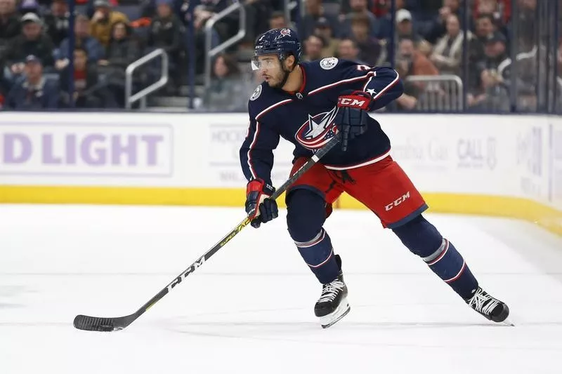 Seth Jones skates with puck against St. Louis Blues