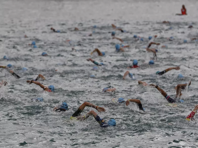 Age group athletes start swim portion of Ironman World Championship Triathlon