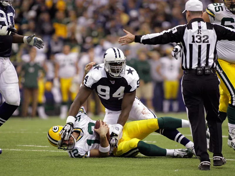 Aaron Rodgers and DeMarcus Ware