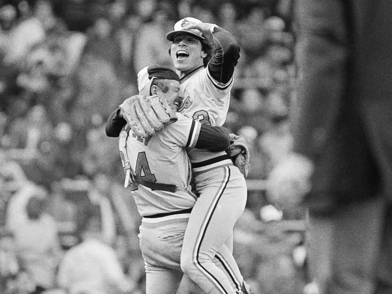 Rick Dempsey and Tippy Martinez celebrate