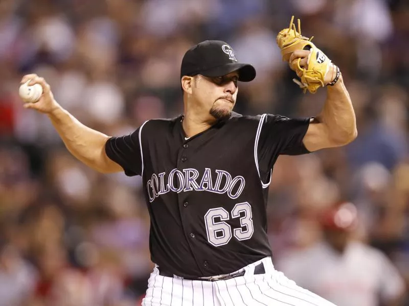 Colorado Rockies relief pitcher Rafael Betancourt works against Cincinnati Reds