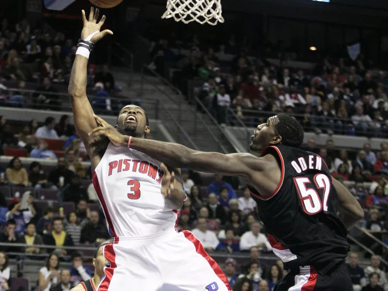 Greg Oden commits foul against Rodney Stuckey