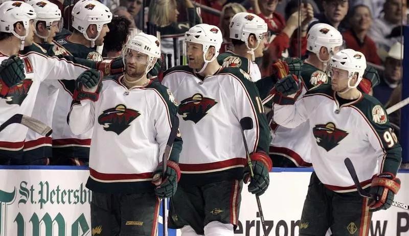 Minnesota Wild players Keith Carney, Todd Fedoruk, Pierre-Marc Bouchard