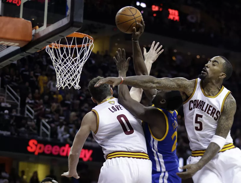 JR Smith and Kevin Love try to defend against Draymond Green