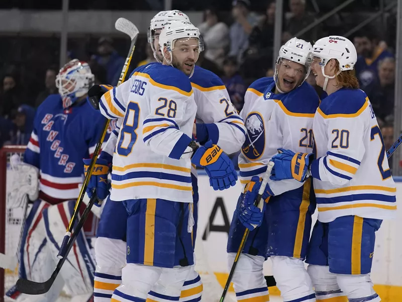 Kyle Okposo celebrates his goal