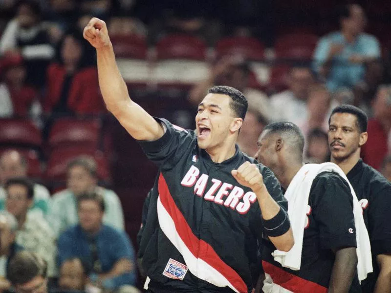 The Portland Trail Blazers’ Alaa Abdelnaby cheers on teammates