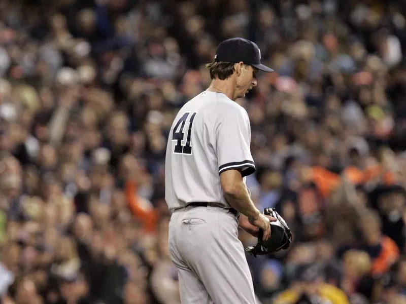 New York Yankees starting pitcher Randy Johnson walks off field