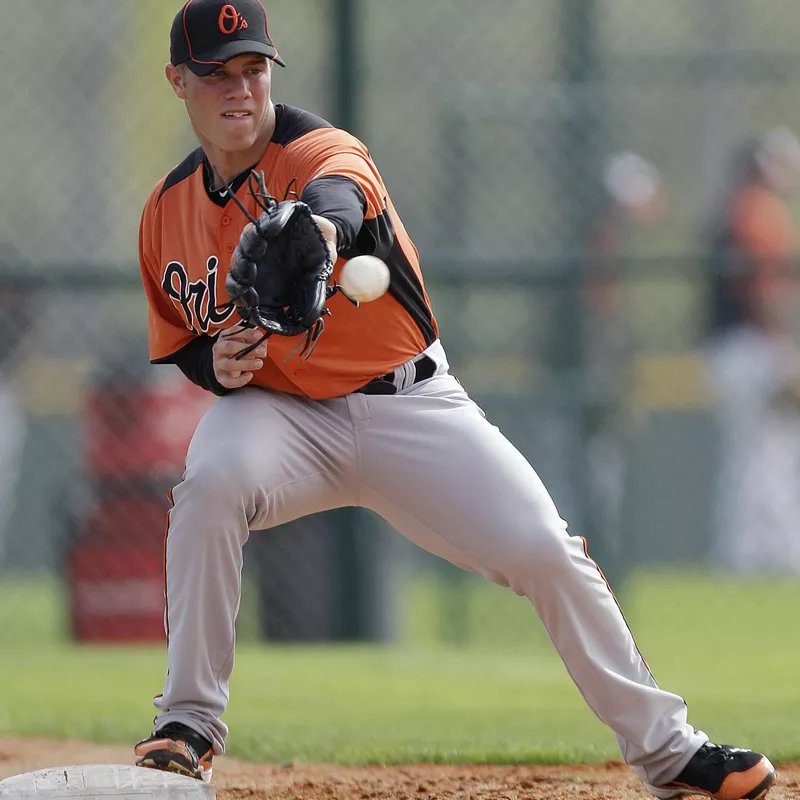 Dylan Bundy catches a ball
