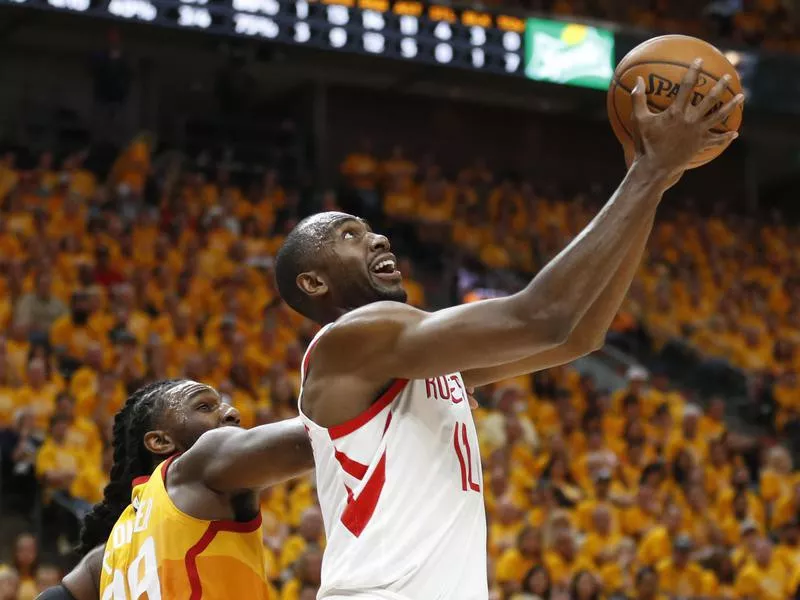 Houston Rockets Luc Mbah a Moute lays ball up