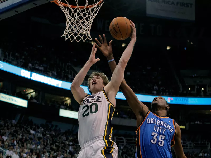 Utah Jazz forward Gordon Hayward is fouled by Oklahoma City Thunder forward Kevin Durant