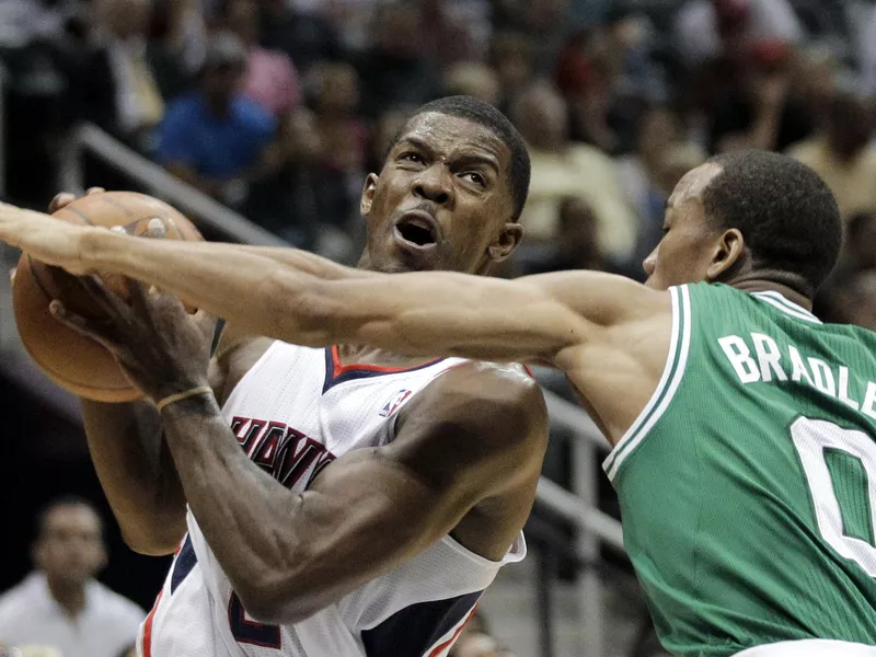 Avery Bradley guards Joe Johnson