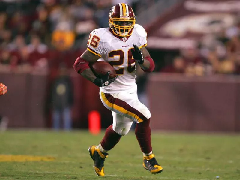 Washington Redskins running back Clinton Portis runs against Cleveland Browns' Sean Jones