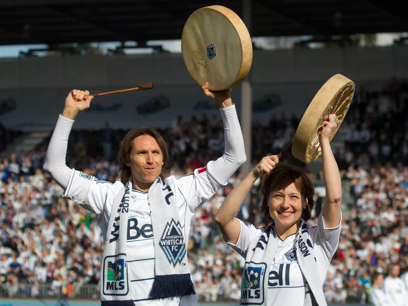 British Columbia Premier Steve Nash and Christy Clark beat drums