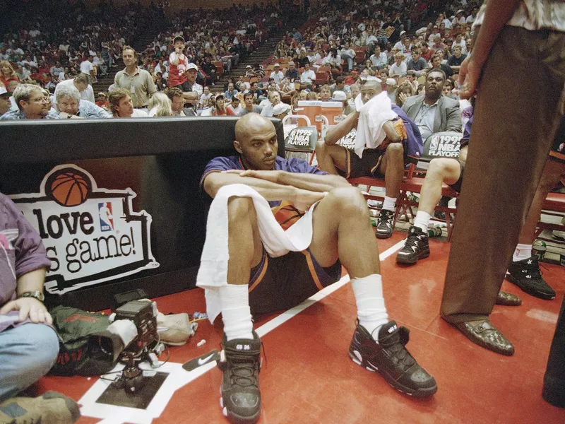 Phoenix Suns forward Charles Barkley sits dejected