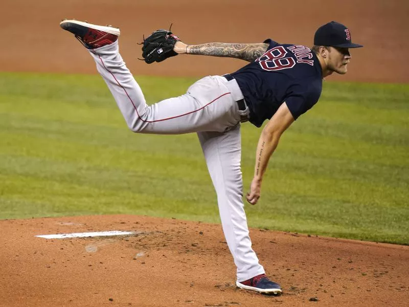 Boston Red Sox starting pitcher Tanner Houck follows through