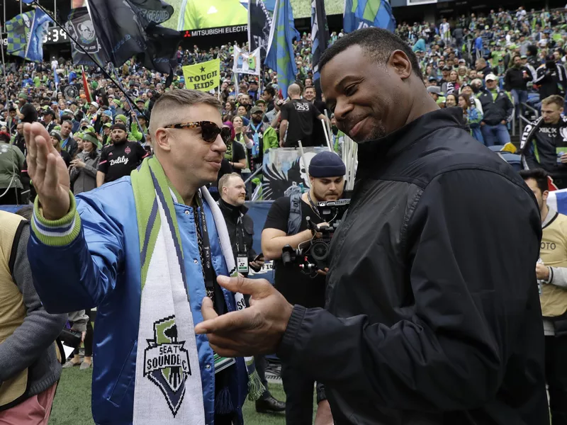 Macklemore interacting with Ken Griffey Jr.