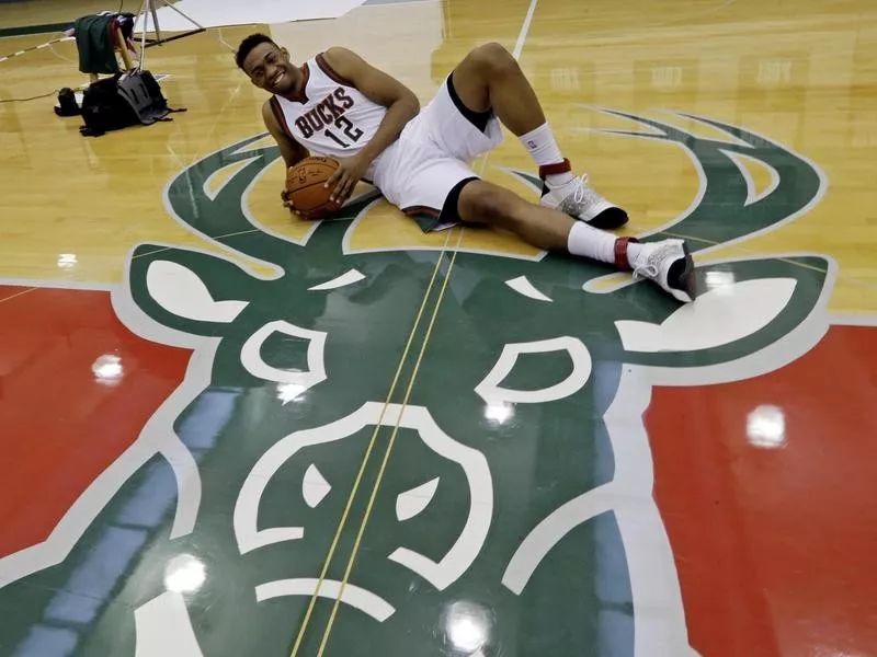 Jabari Parker Posing on Older Bucks Logo