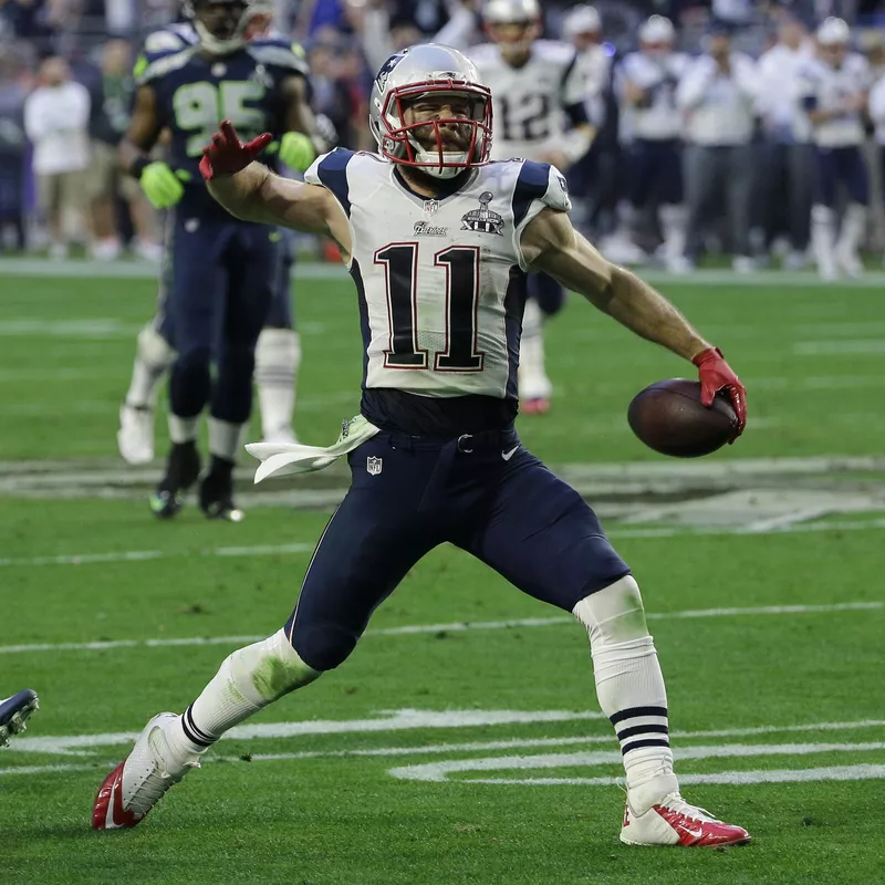 New England Patriots wide receiver Julian Edelman reacts