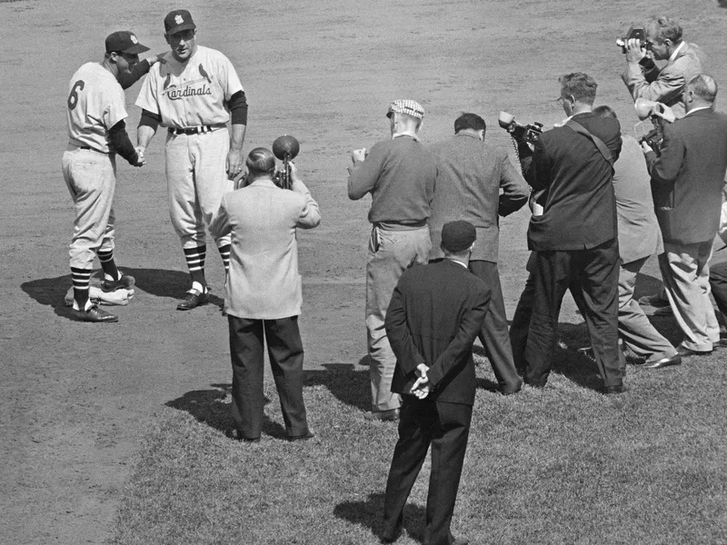 Stan Musial stands with manager Fred Hutchinson