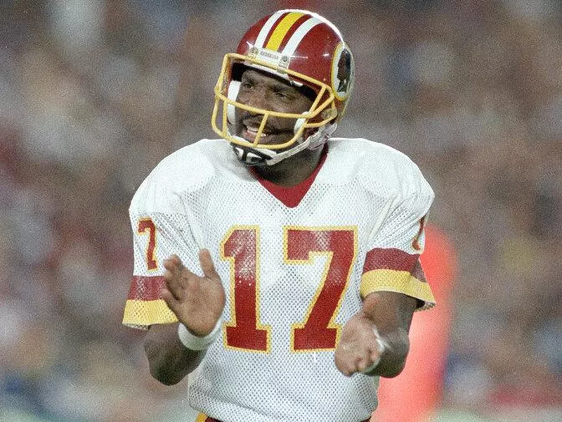 Doug Williams celebrating with the Washington Redskins