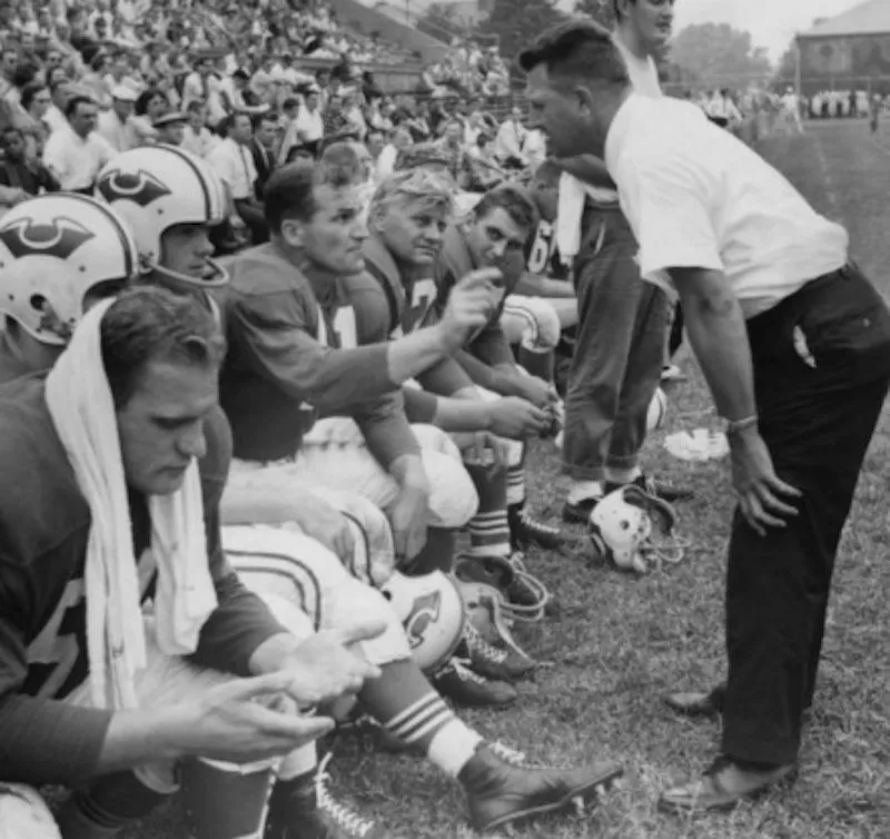 Lou Saban talking to team