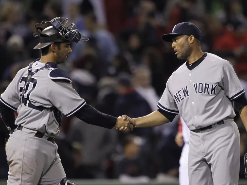 Jorge Posada shakes Mariano Rivera's hand