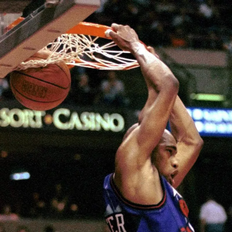 Vince Carter slam dunks ball