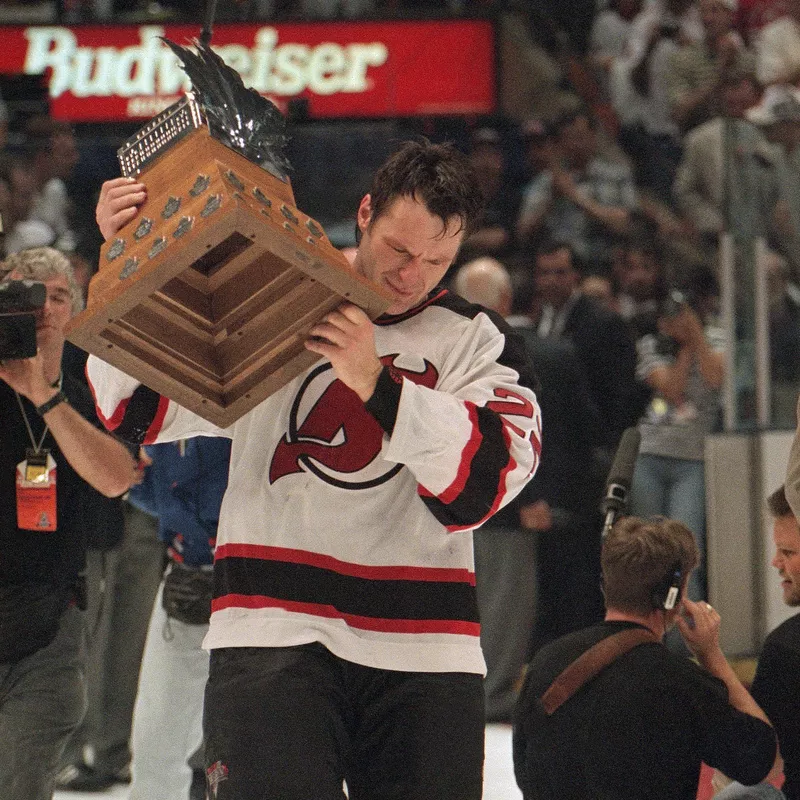 Claude Lemieux cries with trophy