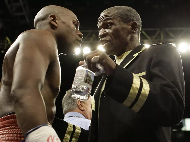 Floyd Mayweather Jr. interacts with Floyd Mayweather Sr.