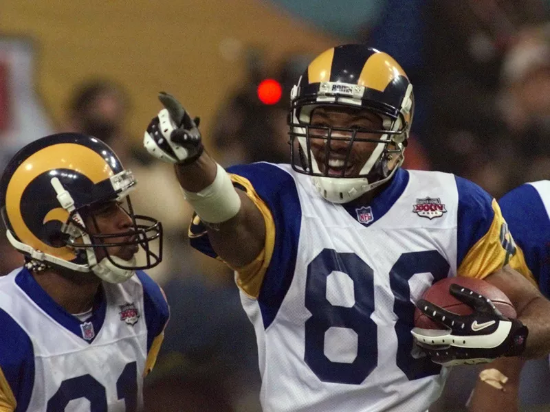 St. Louis Rams Torry Holt celebrates 10-yard touchdown in third quarter