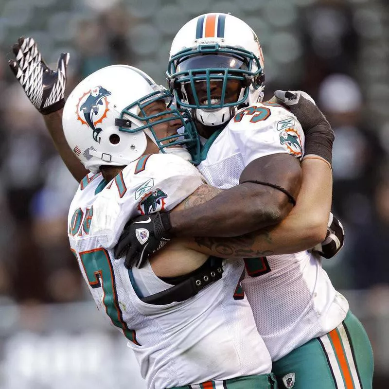 Miami Dolphins running back Ricky Williams celebrates