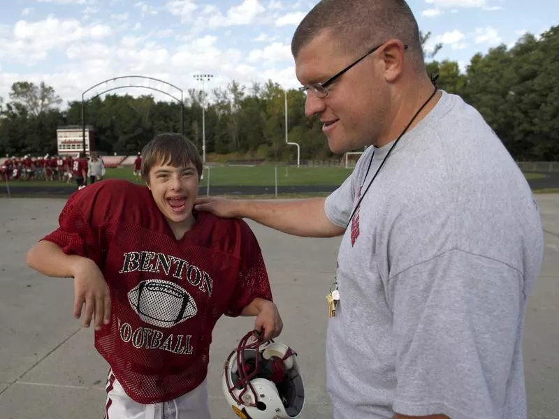 Matt Ziesel with Coach Dan McCamy at practice