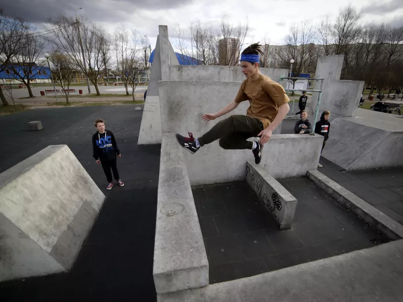 A parkour runner trains for jump