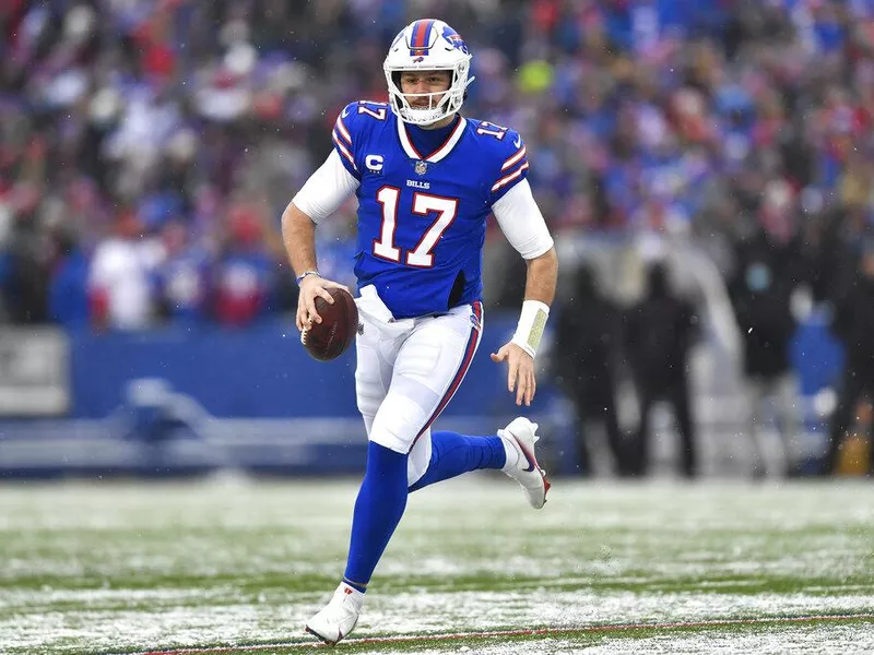 Buffalo Bills quarterback Josh Allen running