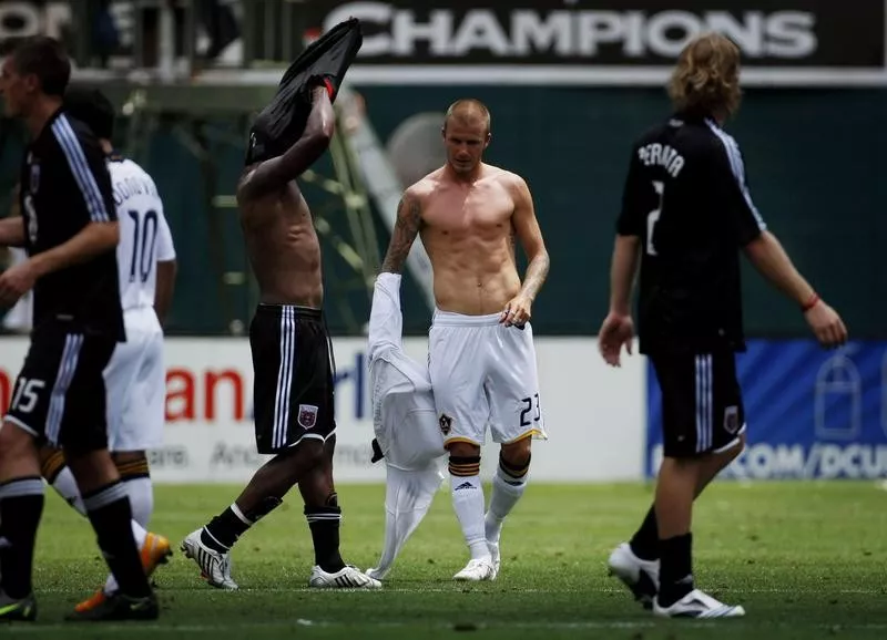 David Beckham exchanges jerseys with Gonzalo Martinez of DC United