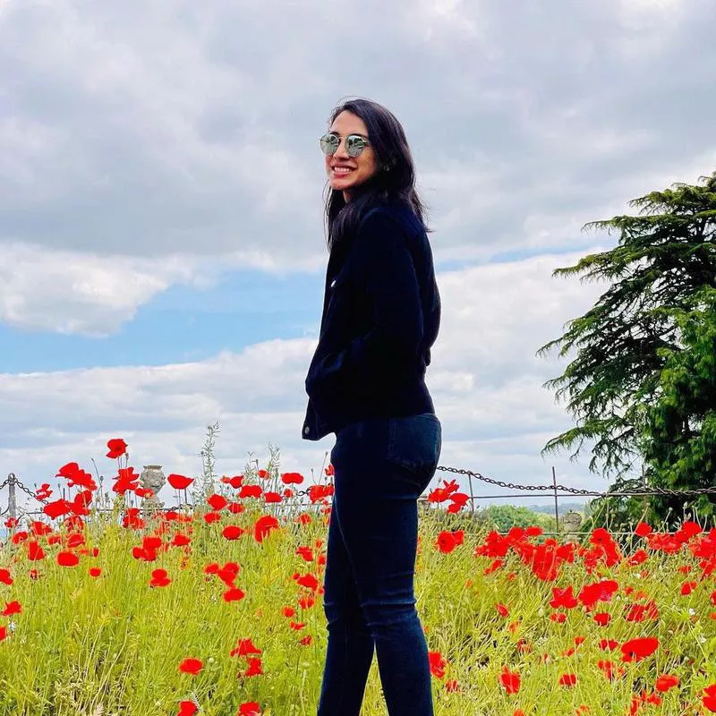 Smriti Mandhana in a field of poppies